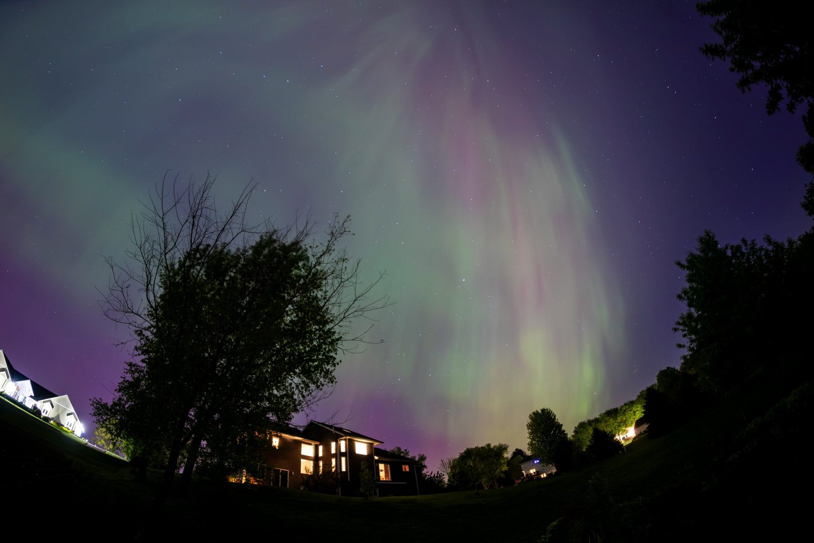the aurora bore is visible in the night sky